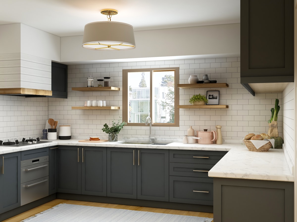 Open kitchen with a stone counter and wooden cabinetry