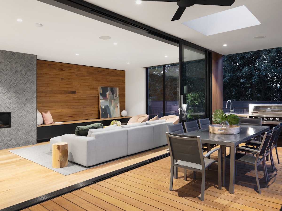 Garden terrace with lounge seating under tropical trees