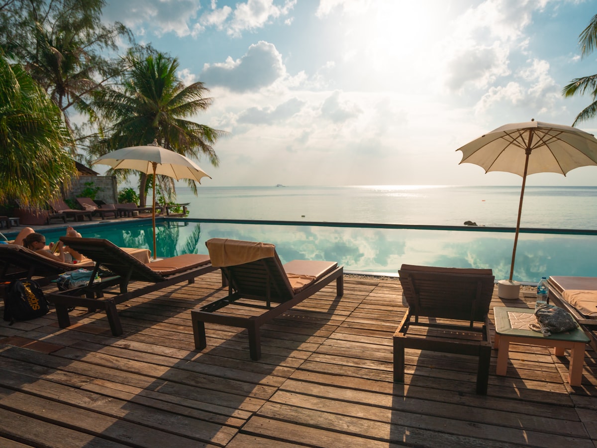 Private swimming pool surrounded by tropical planting