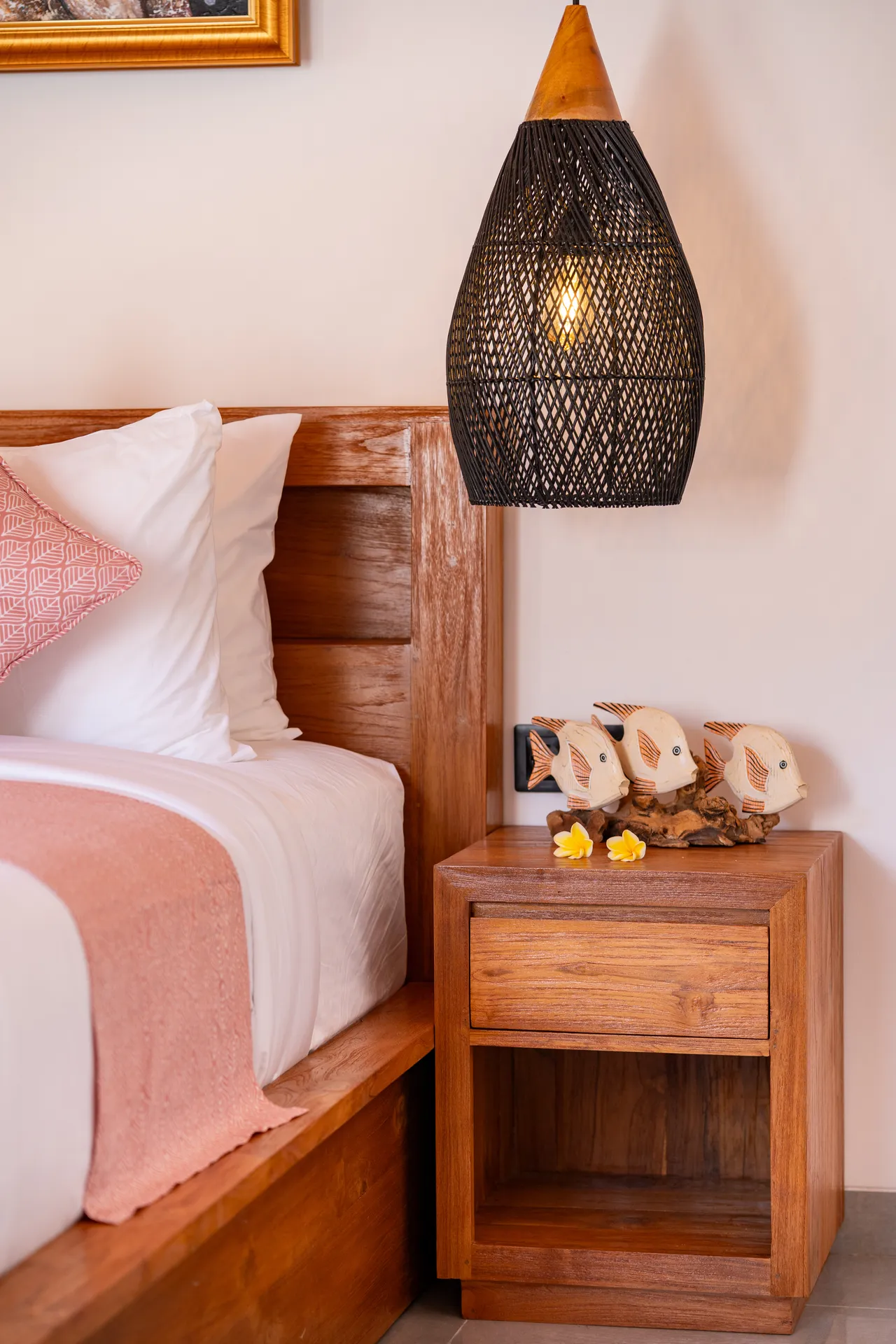 Bedside table with fish figurines