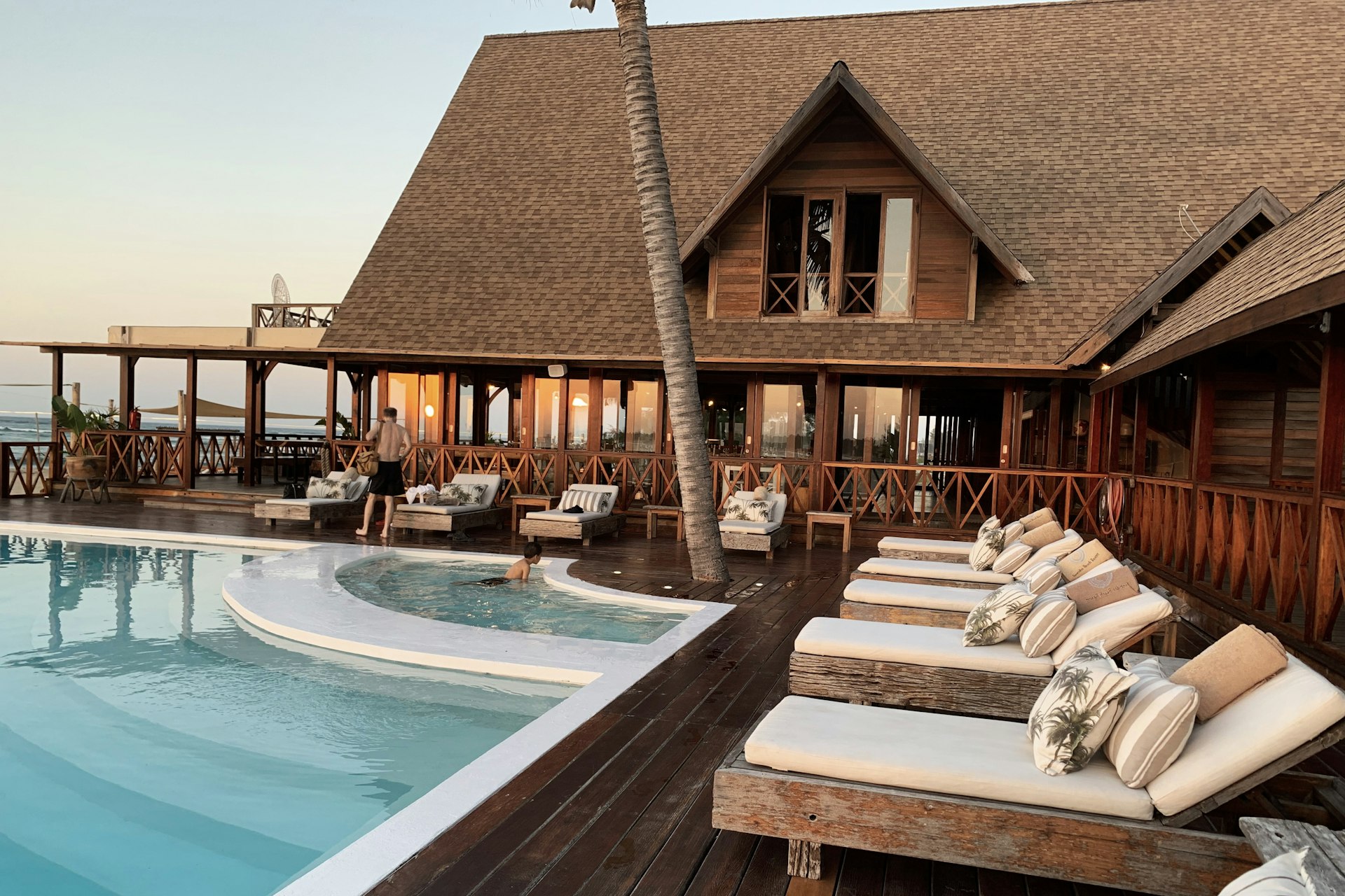 Oka's Villa seen from the pool deck at golden hour