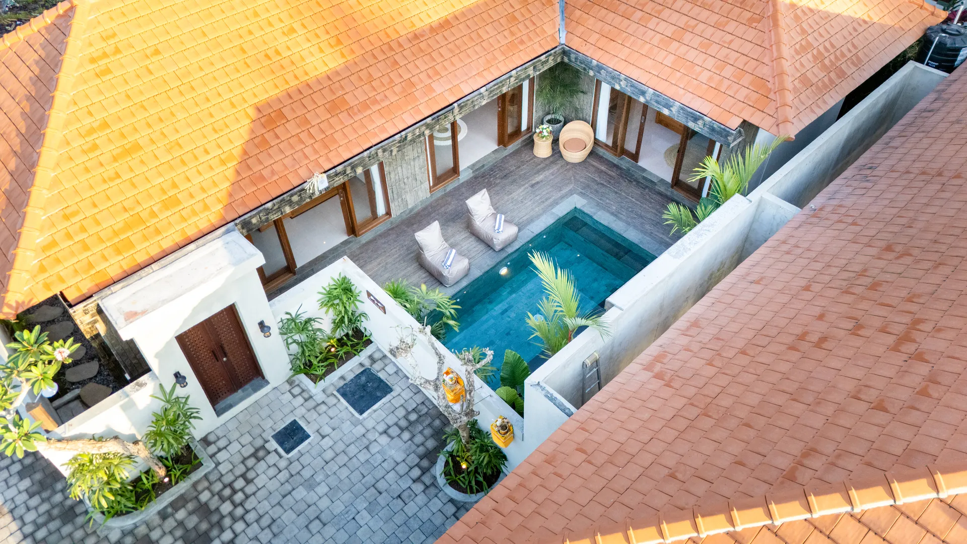 Oka's Villa seen from the pool deck at golden hour